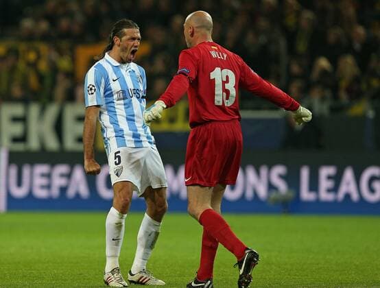 09.04.2013, Fussball Champions League Viertelfinale Rückspiel: Borussia Dortmund - FC Malaga, im Signal-Iduna-Park-Stadion Dortmund. Jubel Malaga zum Tor zum 0:1 v.l. Martin Demichelis (FC Malaga) und Torwart Willy Caballero (FC Malaga)