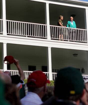 April 10, 2013 - Augusta, GA, USA - A fan tips his hat to Arnold Palmer who said hello to spectators waiting to put chairs out for the Masters Par 3 Contest at Augusta National Golf Club on Wednesday April 10, 2013, in Augusta, Georgia. Masters at Augusta National Golf Club - ZUMAm67