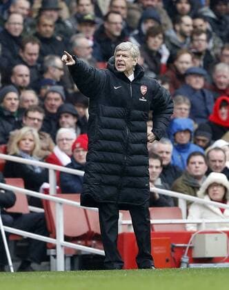 Arsenal s Arsen Wenger looks on .. FC Arsenal London vs Norwich City - Barclays Premier League - Emirates Stadium, London- 12 04 13 - EDITORIAL USE ONLY. No use with unauthorised audio, video, data, fixture lists, club league logos or live services. Online in-match use limited to 120 images, no video emulation. No use in betting, games or single club league player publications.