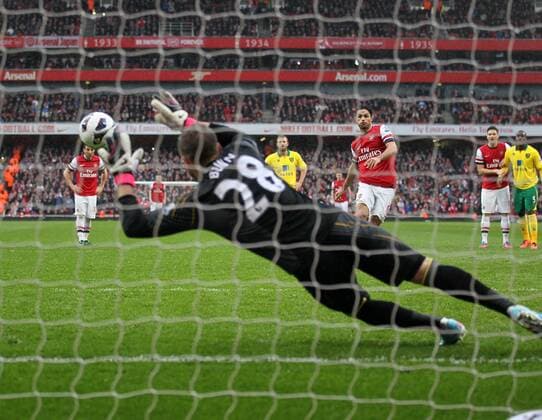 Arsenal s Mikel Arteta scoring his sides opening goal.. FC Arsenal London vs Norwich City - Barclays Premier League - Emirates Stadium, London- 12 04 13 - EDITORIAL USE ONLY. No use with unauthorised audio, video, data, fixture lists, club league logos or live services. Online in-match use limited to 120 images, no video emulation. No use in betting, games or single club league player publications.