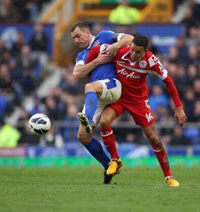 Everton s Darren Gibson battles with QPR s Jermaine Jenas- Barclays Premier League - FC Everton vs Queens Park Rangers QPR - Goodison Park -Liverpool- 13th April 2013 - EDITORIAL USE ONLY. No use with unauthorised audio, video, data, fixture lists, club league logos or live services. Online in-match use limited to 120 images, no video emulation. No use in betting, games or single club league player publications.