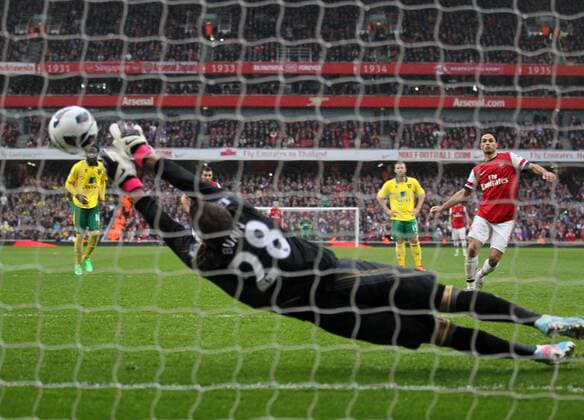 Arsenal s Mikel Arteta scoring his sides opening goal.. FC Arsenal London vs Norwich City - Barclays Premier League - Emirates Stadium, London- 12 04 13 - EDITORIAL USE ONLY. No use with unauthorised audio, video, data, fixture lists, club league logos or live services. Online in-match use limited to 120 images, no video emulation. No use in betting, games or single club league player publications.