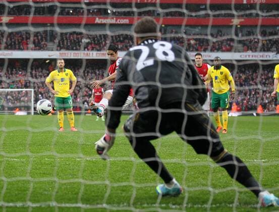 Arsenal s Mikel Arteta scoring his sides opening goal.. FC Arsenal London vs Norwich City - Barclays Premier League - Emirates Stadium, London- 12 04 13 - EDITORIAL USE ONLY. No use with unauthorised audio, video, data, fixture lists, club league logos or live services. Online in-match use limited to 120 images, no video emulation. No use in betting, games or single club league player publications.