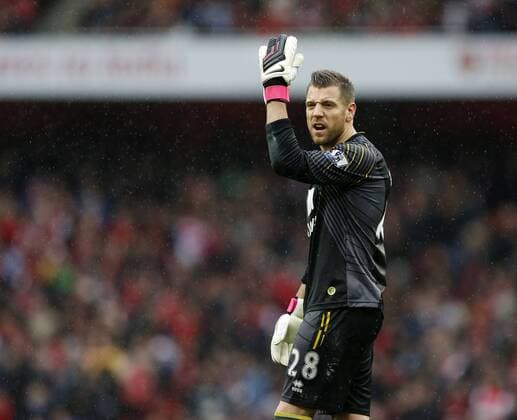 Norwich s Mark Bunn protests after the award of a penalty.. Arsenal FC London - Norwich City. Barclays Premier League - Emirates Stadium, London- Picture DavidxKlein Sportimage EDITORIAL USE ONLY. No use with unauthorised audio, video, data, fixture lists, club league logos or live services. Online in-match use limited to 120 images, no video emulation. No use in betting, games or single club league player publications.
