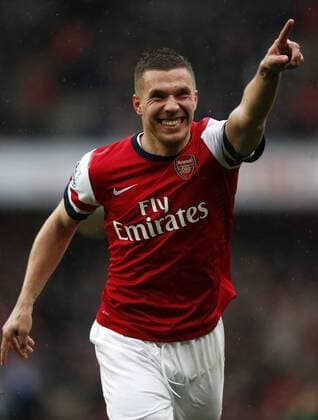 LONDON, April 13, 2013 - Lukas Podolski of Arsenal celebrates scoring during the Barclays Premier League match between Arsenal and Norwich City at the Emirates Stadium in London, Britain, on April 13, 2013. Arsenal won 3-1. (Xinhua Wang Lili) 
