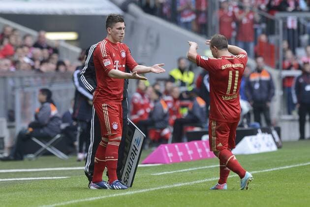 FC Bayern Muenchen gegen 1. FC Nürnberg, Fussball Bundesliga, Allianz Arena, Muenchen. Ergebnis 4 -0. 13.04.2013 Im Bild:Pierre Emil Hojbjerg, Xherdan Shaqiri Â