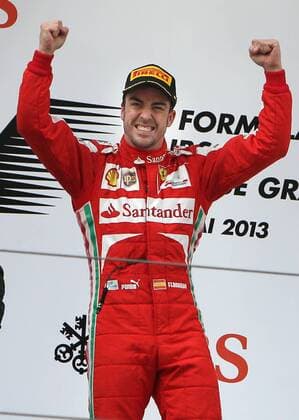 (130414) -- SHANGHAI, April 14, 2013 (Xinhua) -- Ferrari driver Fernando Alonso celebrates on the podium after winning the Formula One Chinese Grand Prix at the Shanghai International circuit, in Shanghai, east China, on April 14, 2013. (Xinhua Fan Jun) CHINA-SHANGHAI-F1 (CN) 