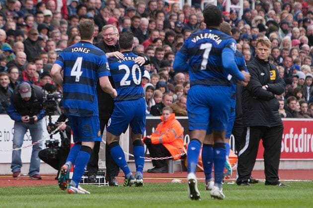 Football - 2012 2013 Premier League - Stoke City vs. Manchester United ManU Robin van Persie of Manchester United ManU celebrates scoring his sides second goal from the penalty spot with manager Alex Ferguson at the Britannia Stadium 