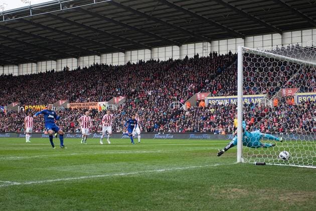 Football - 2012 2013 Premier League - Stoke City vs. Manchester United ManU Robin van Persie of Manchester United ManU scores his sides second goal from the penalty spot at the Britannia Stadium 