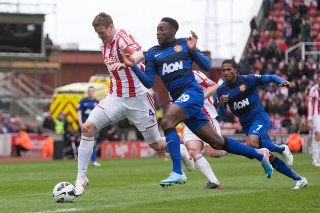 Football - 2012 2013 Premier League - Stoke City vs. Manchester United ManU Danny Welbeck of Manchester United ManU battles Stoke s Robert Huth at the Britannia Stadium 