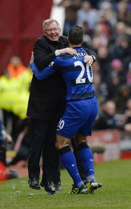 Penalty scorer Robin van Persie of Manchester United ManU celebrates with Sir Alex Ferguson manager of Manchester United ManU - Barclays Premier League - Stoke City vs Manchester Utd - Britannia Stadium - Stoke - England - 14 04 13 - EDITORIAL USE ONLY. No use with unauthorised audio, video, data, fixture lists, club league logos or live services. Online in-match use limited to 120 images, no video emulation. No use in betting, games or single club league player publications.