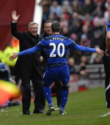 Penalty scorer Robin van Persie of Manchester United ManU celebrates with Sir Alex Ferguson manager of Manchester United ManU - Barclays Premier League - Stoke City vs Manchester Utd - Britannia Stadium - Stoke - England - 14 04 13 - EDITORIAL USE ONLY. No use with unauthorised audio, video, data, fixture lists, club league logos or live services. Online in-match use limited to 120 images, no video emulation. No use in betting, games or single club league player publications.