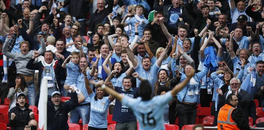 LONDON, April 14, 2013 (Xinhua) -- Supporters of Manchester City celebrate Sergio Kun Aguero s goal during FA Cup semifinal between Manchester City at Wembley Stadium in London, Britain, on April 14, 2013. 