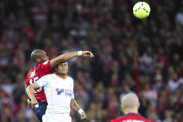 Djibril Sidibe (Losc) vs Andre Ayew (OM) FOOT : Lille vs OM - Ligue 1 - 14 04 2013 JBAutissier Panoramic 