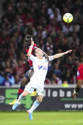 Idrissa Gana Gueye (Losc) vs Mathieu Valbuena (OM) FOOT : Lille vs OM - Ligue 1 - 14 04 2013 JBAutissier Panoramic 