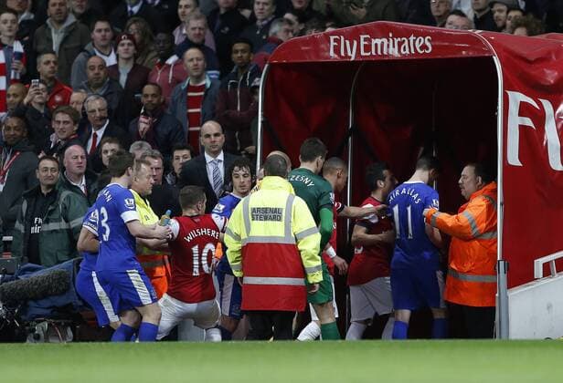 Arsenal s Jack Wilshere tussles with Everton s players in the tunnel at half time.. FC Arsenal v FC Everton - Barclays Premier League - Emirates Stadium, London- 16 04 13 - Picture David Klein Sportimage EDITORIAL USE ONLY. No use with unauthorised audio, video, data, fixture lists, club league logos or live services. Online in-match use limited to 120 images, no video emulation. No use in betting, games or single club league player publications.