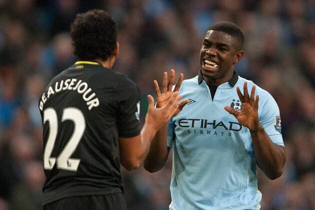 Football - 2012 2013 Premier League - Manchester City vs. Wigan Athletic Micah Richards of Manchester City remonstrates with Wigan s Jean Beausejour at the Etihad Stadium 