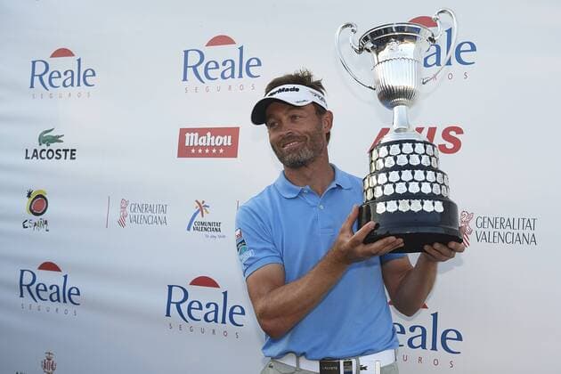 VALENCIA, SPAIN - APRIL 21: Raphael Jacquelin of France celebrates after winning the Open de Espana 2013 at Parador de El Saler on April 21, 2013 in Valencia, Spain (Photo by Aitor Alcalde Colomer). 