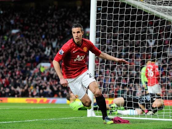 Robin van Persie of Manchester United turns to celebrate the first goal - Barclays Premier League - Manchester Utd ManU vs Aston Villa - Old Trafford Stadium - Manchester - 22 04 13 - EDITORIAL USE ONLY. No use with unauthorised audio, video, data, fixture lists, club league logos or live services. Online in-match use limited to 120 images, no video emulation. No use in betting, games or single club league player publications.