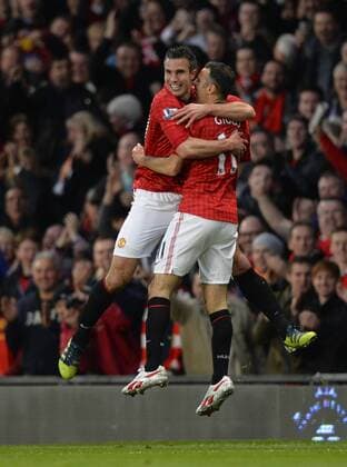 Robin van Persie and Ryan Giggs of Manchester United celebrate the second goal - Barclays Premier League - Manchester Utd ManU vs Aston Villa - Old Trafford Stadium - Manchester - 22 04 13 - EDITORIAL USE ONLY. No use with unauthorised audio, video, data, fixture lists, club league logos or live services. Online in-match use limited to 120 images, no video emulation. No use in betting, games or single club league player publications.