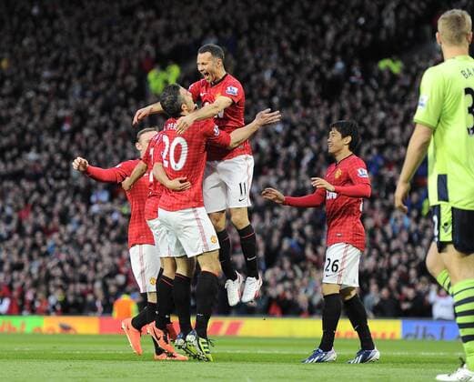 goalscorer Robin van Persie of Manchester United celebrates with the providor Ryan Giggs of Manchester United - Barclays Premier league - Manchester Utd ManU vs Aston Villa - Old Trafford Stadium - Manchester - 22 04 13 - EDITORIAL USE ONLY. No use with unauthorised audio, video, data, fixture lists, club league logos or live services. Online in-match use limited to 120 images, no video emulation. No use in betting, games or single club league player publications.