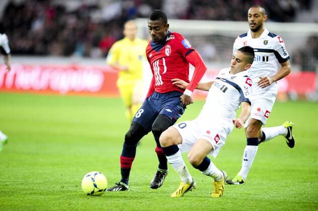 Salomon Kalou (Lille) vs Ryad Boudebouz (Sochaux) FOOTBALL : OSC Lille vs FC Sochaux - Ligue 1 - 26 04 2013 JBAutissier 