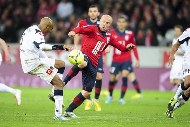 Florent Balmont (Lille) vs Carlao (Sochaux) FOOTBALL : Lille vs Sochaux - Ligue 1 - 26 04 2013 JBAutissier Panoramic 