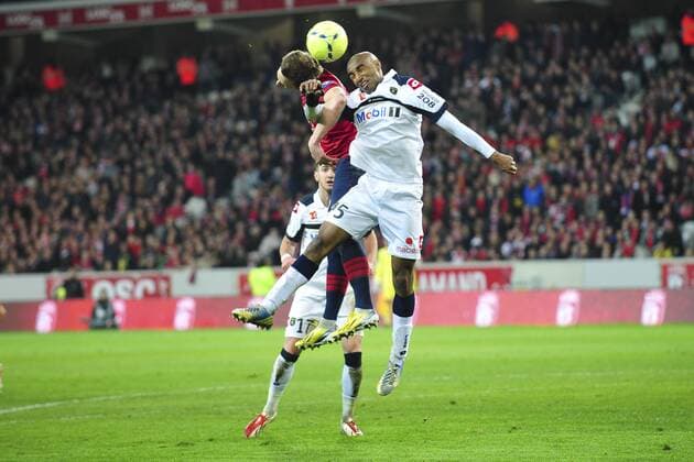 Nolan Roux (Lille) vs Carlao (Sochaux) FOOTBALL : Lille vs Sochaux - Ligue 1 - 26 04 2013 JBAutissier Panoramic 