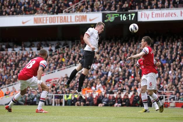Phil Jones of Manchester United misses the target with a header - Barclays Premier League - FC Arsenal vs Manchester United (ManU) - Emirates Stadium London - Season 12 13 - 28th April 2013 - EDITORIAL USE ONLY. No use with unauthorised audio, video, data, fixture lists, club league logos or live services. Online in-match use limited to 120 images, no video emulation. No use in betting, games or single club league player publications.