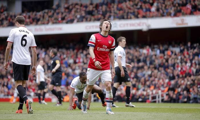 Tomas Rosicky of FC Arsenal reacts after wide in the second half - Barclays Premier League - FC Arsenal vs Manchester United (ManU) - Emirates Stadium London - Season 12 13 - 28th April 2013 - EDITORIAL USE ONLY. No use with unauthorised audio, video, data, fixture lists, club league logos or live services. Online in-match use limited to 120 images, no video emulation. No use in betting, games or single club league player publications.
