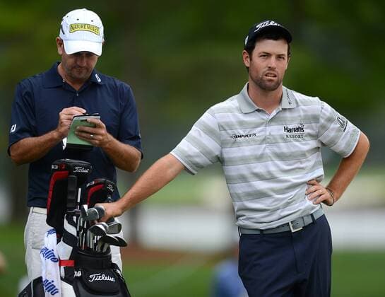 April 30, 2013 - Charlotte, NC, USA - Robert Streb, right, waits with his caddie along the 18th fairway during a practice round at Quail Hollow Club in Charlotte, North Carolina, on Tuesday, April 30, 2013. Streb is among the golfers preparing to compete in the Wells Fargo Championship. Wells Fargo Championship - ZUMAm67
