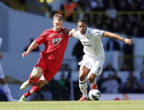 Tottenham s Moussa Dembele tussles with Southampton s Rickie Lambert..- Barclays Premier League - Tottenham vs Southampton - White Hart Lane - London - 4th May 2013 - Pic David Klein Sportimage EDITORIAL USE ONLY. No use with unauthorised audio, video, data, fixture lists, club league logos or live services. Online in-match use limited to 120 images, no video emulation. No use in betting, games or single club league player publications.