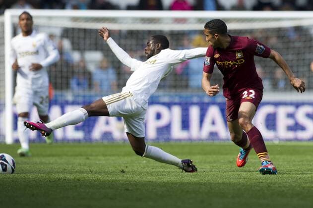 Football - 2012 2013 Premier League - Swansea City vs. Manchester City nathan dyer & gael clichy 