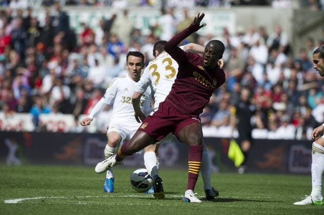 Football - 2012 2013 Premier League - Swansea City vs. Manchester City yay a tour & ben davies collide. 