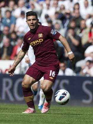 Football - 2012 2013 Premier League - Swansea City vs. Manchester City sergio aguero attacks. 