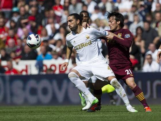 Football - 2012 2013 Premier League - Swansea City vs. Manchester City chico flores & david silva. 