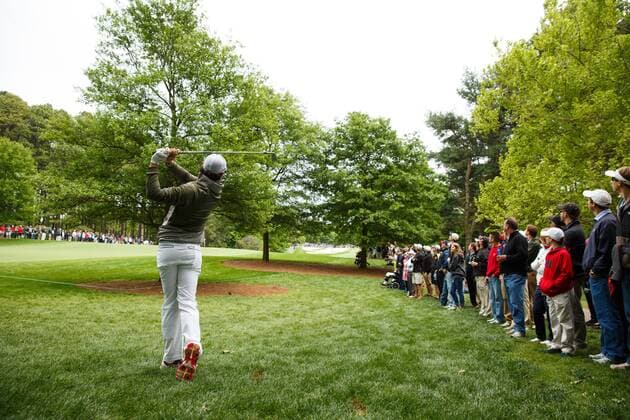 04 May 2013: Rory McIlroy shoots his second shot from the crowd during the third round action of the Wells Fargo Championship Tournament at Quail Hollow Country Club, Charlotte, North Carolina. GOLF: MAY 04 PGA Golf Herren - Wells Fargo Championship - Third Round Icon130504011 EDITORIAL USE ONLY