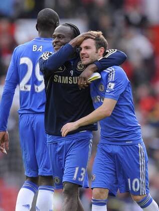 Victor Moses of Chelsea and Juan Mata of Chelsea celebrate the win - Barclays Premier League - Manchester Utd vs Chelsea - Old Trafford Stadium - Manchester - 05 05 13 - Picture Simon Bellis Sportimage EDITORIAL USE ONLY. No use with unauthorised audio, video, data, fixture lists, club league logos or live services. Online in-match use limited to 120 images, no video emulation. No use in betting, games or single club league player publications.