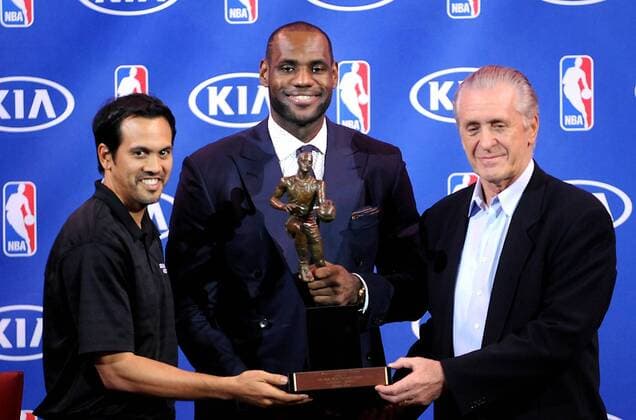 May 5, 2013 - Miami, FL - Florida, USA - United States - Miami--- fl-lebron-mvp-050513a--Miami Heat forward LeBron James holds his Most Valuable Player trophy Sunday at American Airlines Arena. At left is Heat head coach Erik Spoelstra and at right is President and General Manager Pat Riley. - ZUMAss5
