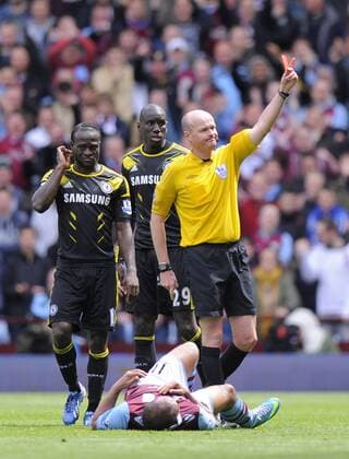 Referee Leo Mason shows the red card to Ramires of Chelsea (not in picture) - Barclays Premier League - Aston Villa vs Chelsea - Villa Park Stadium - Birmingham - England - 11 05 13 - Picture Simon Bellis Sportimage EDITORIAL USE ONLY. No use with unauthorised audio, video, data, fixture lists, club league logos or live services. Online in-match use limited to 120 images, no video emulation. No use in betting, games or single club league player publications.