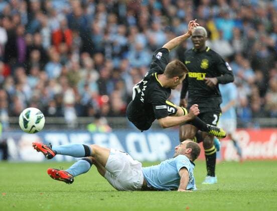11.05.2013 London, England.Pablo Zabaleta of Manchester City fouls Callum McManaman of Wigan Athletic during the FA Cup Final between Wigan Athletic and Manchester City from Wembley Stadium. xKieranxGalvinx  ActionPlus20146552