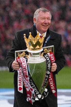 Football - Premier League 2012 2013 - Manchester United - Alex Ferguson, manager of Manchester United celebrates with the trophy at Old Trafford