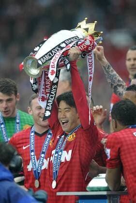 Shinji Kagawa of Manchester United lifts the Premier League trophy - Barclays Premier League - Manchester United ManU - Old Trafford Stadium - Manchester - England - 12 05 13 - EDITORIAL USE ONLY. No use with unauthorised audio, video, data, fixture lists, club league logos or live services. Online in-match use limited to 120 images, no video emulation. No use in betting, games or single club league player publications.