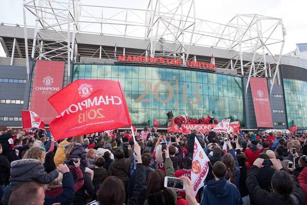 A general view as the bus leaves Old Trafford - Manchester United - Premier League Trophy Parade - Manchester - England -13 05 2013 - EDITORIAL USE ONLY. No use with unauthorised audio, video, data, fixture lists, club league logos or live services. Online in-match use limited to 120 images, no video emulation. No use in betting, games or single club league player publications.