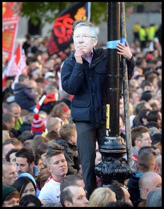 Manchester United Fans wait for Manchester United players to turn up in Albert Square, Manchester, Manchester United celebrate winning their 20th league title winning the Premier League, Monday May 13, 2013. AndrewxParsonsx xi-Images AJP