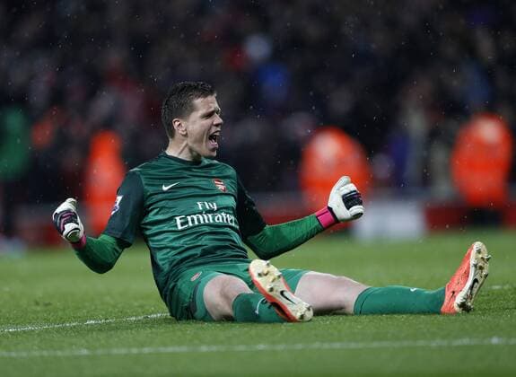 Arsenal s Wojciech Szczesny celebrates his sides second goal - Barclays Premier League - Arsenal vs Wigan - Emirates Stadium - London - 14 05 2013 - Pic David Klein Sportimage EDITORIAL USE ONLY. No use with unauthorised audio, video, data, fixture lists, club league logos or live services. Online in-match use limited to 120 images, no video emulation. No use in betting, games or single club league player publications.