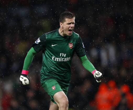 Arsenal s Wojciech Szczesny celebrates his sides second goal - Barclays Premier League - Arsenal vs Wigan - Emirates Stadium - London - 14 05 2013 - Pic David Klein Sportimage EDITORIAL USE ONLY. No use with unauthorised audio, video, data, fixture lists, club league logos or live services. Online in-match use limited to 120 images, no video emulation. No use in betting, games or single club league player publications.