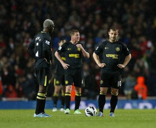 Wigan s Shaun Maloney looks on dejected after going 3-1 down - Barclays Premier League - Arsenal vs Wigan - Emirates Stadium - London - 14 05 2013 - Pic David Klein Sportimage EDITORIAL USE ONLY. No use with unauthorised audio, video, data, fixture lists, club league logos or live services. Online in-match use limited to 120 images, no video emulation. No use in betting, games or single club league player publications.