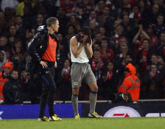 Wigan s Joel Robles looks on dejected at the final whistle - Barclays Premier League - Arsenal vs Wigan - Emirates Stadium - London - 14 05 2013 - Pic David Klein Sportimage EDITORIAL USE ONLY. No use with unauthorised audio, video, data, fixture lists, club league logos or live services. Online in-match use limited to 120 images, no video emulation. No use in betting, games or single club league player publications.