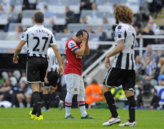 Santi Cazorla of Arsenal (C) rues a missed chance on goal - Barclays Premier League - Newcastle United - Arsenal FC London. St. James Park - Newcastle - 19 05 2013 - PicxRichardxLee Sportimage EDITORIAL USE ONLY. No use with unauthorised audio, video, data, fixture lists, club league logos or live services. Online in-match use limited to 120 images, no video emulation. No use in betting, games or single club league player publications.